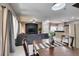 Dining area open to living room, creating a spacious and versatile living space with lots of light at 5509 Ante Up Ct # 102, Las Vegas, NV 89122