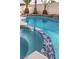 Close-up of a pool with spa, showcasing stylish tile work and clear, inviting water at 6 Megan Dr, Henderson, NV 89074
