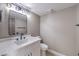 Modern bathroom featuring white cabinets, white countertops, dark fixtures and new lighting at 6 Megan Dr, Henderson, NV 89074