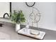 Bathroom decor features a face sculpture and a vase with greenery on the countertop at 6 Megan Dr, Henderson, NV 89074
