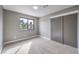 Neutral bedroom with a double closet and large window at 6 Megan Dr, Henderson, NV 89074