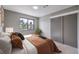 Cozy bedroom with a bed, window and a double closet at 6 Megan Dr, Henderson, NV 89074