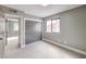 Neutral bedroom with double closets, a window, and grey paint at 6 Megan Dr, Henderson, NV 89074
