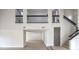 Lofted interior view of open floor plan with staircase and contemporary railing at 6 Megan Dr, Henderson, NV 89074