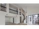 Interior shot featuring the staircase and lofted view of the open-concept living space at 6 Megan Dr, Henderson, NV 89074