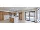 This modern kitchen features stainless steel appliances, an island with seating, and access to the backyard at 6 Megan Dr, Henderson, NV 89074