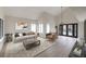 Bright and airy living room with modern decor and doors leading to the outdoor space at 6 Megan Dr, Henderson, NV 89074