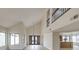 Spacious living room with large windows and tall ceilings provides natural light at 6 Megan Dr, Henderson, NV 89074