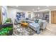 Bright living room featuring a plush sectional sofa and contemporary decor, perfect for relaxing and entertaining at 6 Megan Dr, Henderson, NV 89074