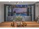 View from dining area to the private backyard oasis with a sparkling pool at 6 Megan Dr, Henderson, NV 89074
