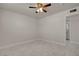 A bright bedroom features marble-style tiling and a ceiling fan at 6225 Rassler Ave, Las Vegas, NV 89107