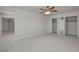 Bedroom featuring a closet, ceiling fan, and seamless access to the main living areas at 6225 Rassler Ave, Las Vegas, NV 89107
