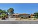 Charming single-story home featuring a low-maintenance yard, covered entry, and spacious driveway at 6225 Rassler Ave, Las Vegas, NV 89107