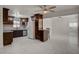 Updated kitchen features wood cabinetry, stainless appliances, tile backsplash, and bright open layout at 6225 Rassler Ave, Las Vegas, NV 89107