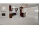 Open floor plan with updated kitchen, wood cabinetry, stainless appliances and bright open layout at 6225 Rassler Ave, Las Vegas, NV 89107
