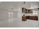 Updated kitchen features wood cabinetry, stainless appliances, tile backsplash and bright and open layout at 6225 Rassler Ave, Las Vegas, NV 89107