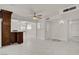 Open floor plan with tile flooring, neutral walls, updated fixtures, and lots of space at 6225 Rassler Ave, Las Vegas, NV 89107