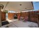 Covered outdoor patio with grill and seating area overlooking pool at 6225 Rassler Ave, Las Vegas, NV 89107