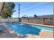 Backyard pool featuring desert landscaping and fenced in perimeter at 6225 Rassler Ave, Las Vegas, NV 89107