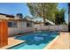 Backyard pool featuring desert landscaping and the exterior of the home at 6225 Rassler Ave, Las Vegas, NV 89107