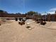 Unfinished backyard with gravel and brick privacy walls at 6287 Stone Hollow Ave, Las Vegas, NV 89156