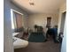 Bedroom featuring window for natural light, carpet flooring, and neutral paint at 6287 Stone Hollow Ave, Las Vegas, NV 89156