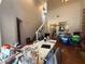Living room featuring stairs to the second floor and access to the kitchen at 6287 Stone Hollow Ave, Las Vegas, NV 89156
