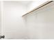 Empty walk-in closet features rod and shelf for simple organization at 6308 Lawton Ave, Las Vegas, NV 89107