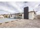 Charming single story home with desert landscape and black brick chimney at 6308 Lawton Ave, Las Vegas, NV 89107