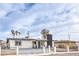 Charming single story home with desert landscape, blue front door and black accents at 6308 Lawton Ave, Las Vegas, NV 89107