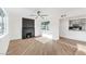 Open living room design with a fireplace and abundant natural light at 6308 Lawton Ave, Las Vegas, NV 89107
