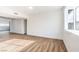 Bright living room with updated flooring and neutral wall paint at 6308 Lawton Ave, Las Vegas, NV 89107