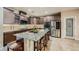 Beautiful kitchen features granite countertops, stainless steel appliances, and ample cabinet space at 7030 Silver Ridge Peak St, Las Vegas, NV 89166