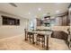 Well-equipped kitchen with granite counters, tile flooring, and stainless steel appliances at 7030 Silver Ridge Peak St, Las Vegas, NV 89166