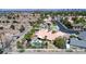 Elevated view of a property featuring a pool, landscaping, and a covered patio in a neighborhood at 7540 Crystal Cave Dr, Las Vegas, NV 89117