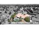 Aerial view of a property featuring a pool, landscaping, and a covered patio in a neighborhood at 7540 Crystal Cave Dr, Las Vegas, NV 89117