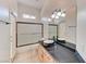 Bathroom featuring a vessel sink, a shower with glass door, and tile flooring at 7540 Crystal Cave Dr, Las Vegas, NV 89117