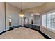 Open floor plan with tile and marble floors, arched doorways and a fireplace feature at 7540 Crystal Cave Dr, Las Vegas, NV 89117