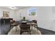Modern dining area with a sleek table and stylish chairs, perfect for Gathering meals at 934 Lewis Ct, Henderson, NV 89015
