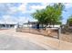 Charming single-story home with a well-maintained front yard and wrought iron fence for added curb appeal at 934 Lewis Ct, Henderson, NV 89015