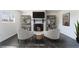 Cozy seating area with a fireplace and elegant shelving, perfect for relaxation at 934 Lewis Ct, Henderson, NV 89015