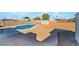 Backyard featuring a pool and large area for entertaining in the open space with a storage shed at 934 Lewis Ct, Henderson, NV 89015