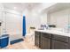 Bathroom with white subway tiles, a shower with blue curtain, and dark vanity at 965 Nevada State Dr # 15104, Henderson, NV 89002
