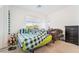 Sunlit bedroom featuring a large window and view, carpeted floors, and cozy, inviting decor at 965 Nevada State Dr # 15104, Henderson, NV 89002