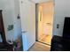 White door opens to reveal an elevator with wood floors and a sleek, modern design at 965 Nevada State Dr # 15104, Henderson, NV 89002