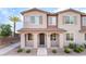 Charming two-story home with a covered entryway and well-maintained landscaping at 965 Nevada State Dr # 15104, Henderson, NV 89002