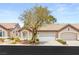 Charming single-story home featuring a well-maintained yard, mature tree, and two-car garage at 9688 Meeks Bay Ave, Las Vegas, NV 89148