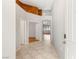 Bright and airy foyer with tile flooring, neutral paint, and an open view into other rooms at 9688 Meeks Bay Ave, Las Vegas, NV 89148