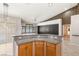 Kitchen with a breakfast bar and stainless steel appliances at 9688 Meeks Bay Ave, Las Vegas, NV 89148