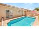 Refreshing pool with a baja step and a patio, perfect for cooling off and relaxing at 9688 Meeks Bay Ave, Las Vegas, NV 89148